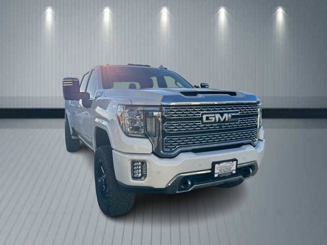 2021 GMC Sierra 2500HD Denali in Summit White — front three-quarter view