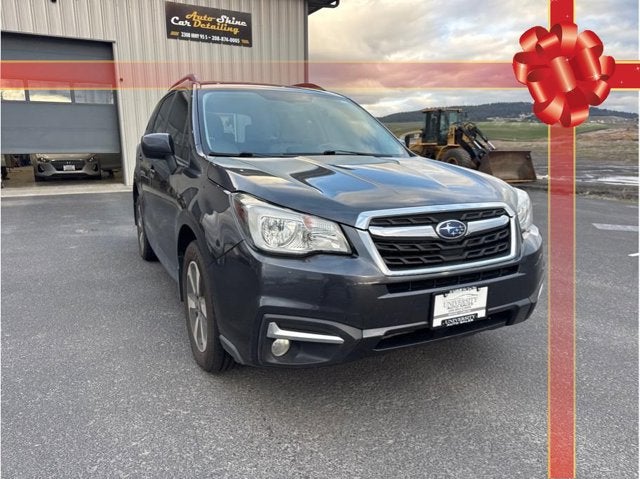 2017 Subaru Forester Premium in Dark Gray Metallic — front three-quarter view